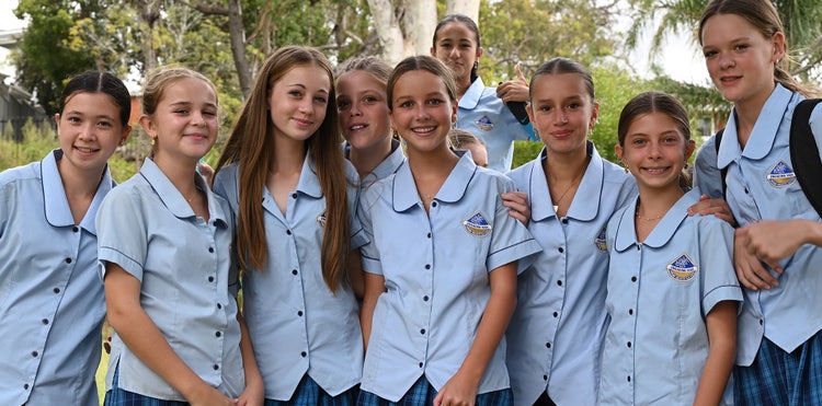 A group of smiling students in junior years