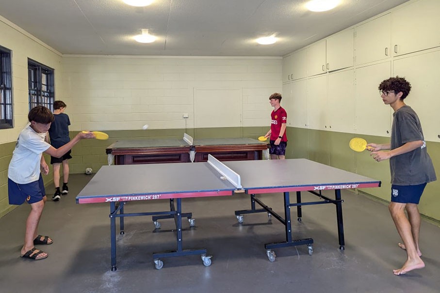 Students playing table tennis