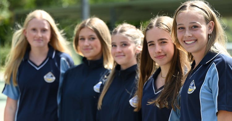 Smiling student in sports uniform
