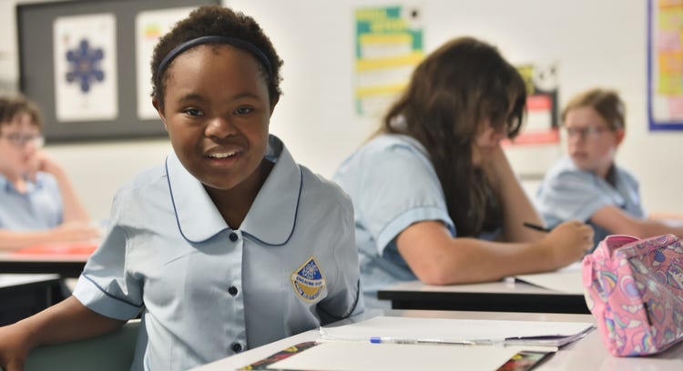 smiling student in class