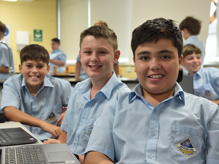Smiling students in classroom